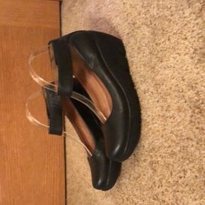 Clark wedge shoes with velcro adjustable ankle strap.  2” wedge heel.